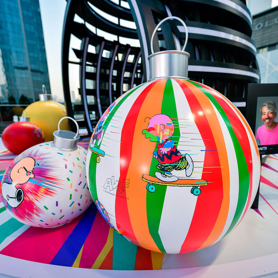 Two giant, colourful Christmas ornaments.