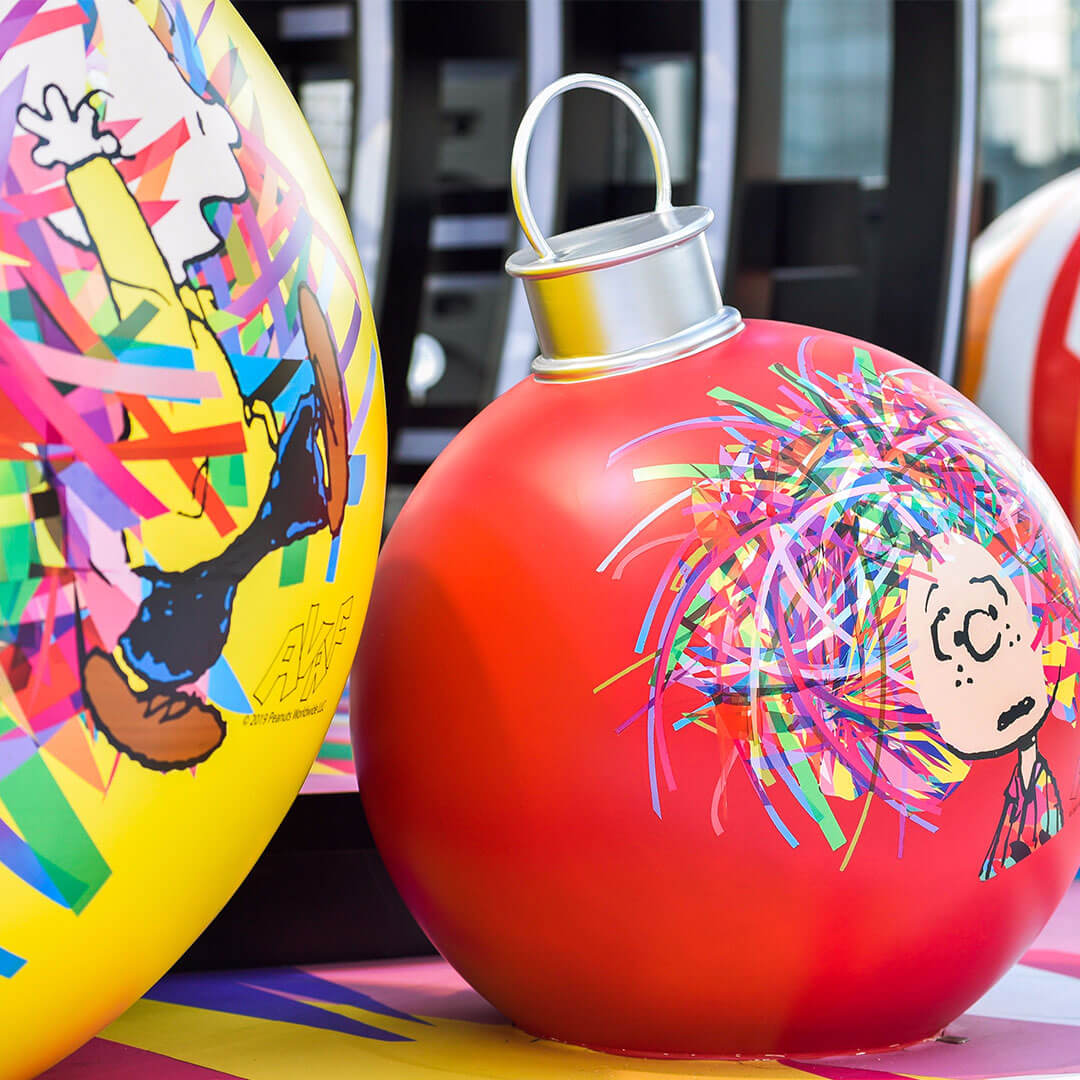 A giant red and yellow Christmas ornament.