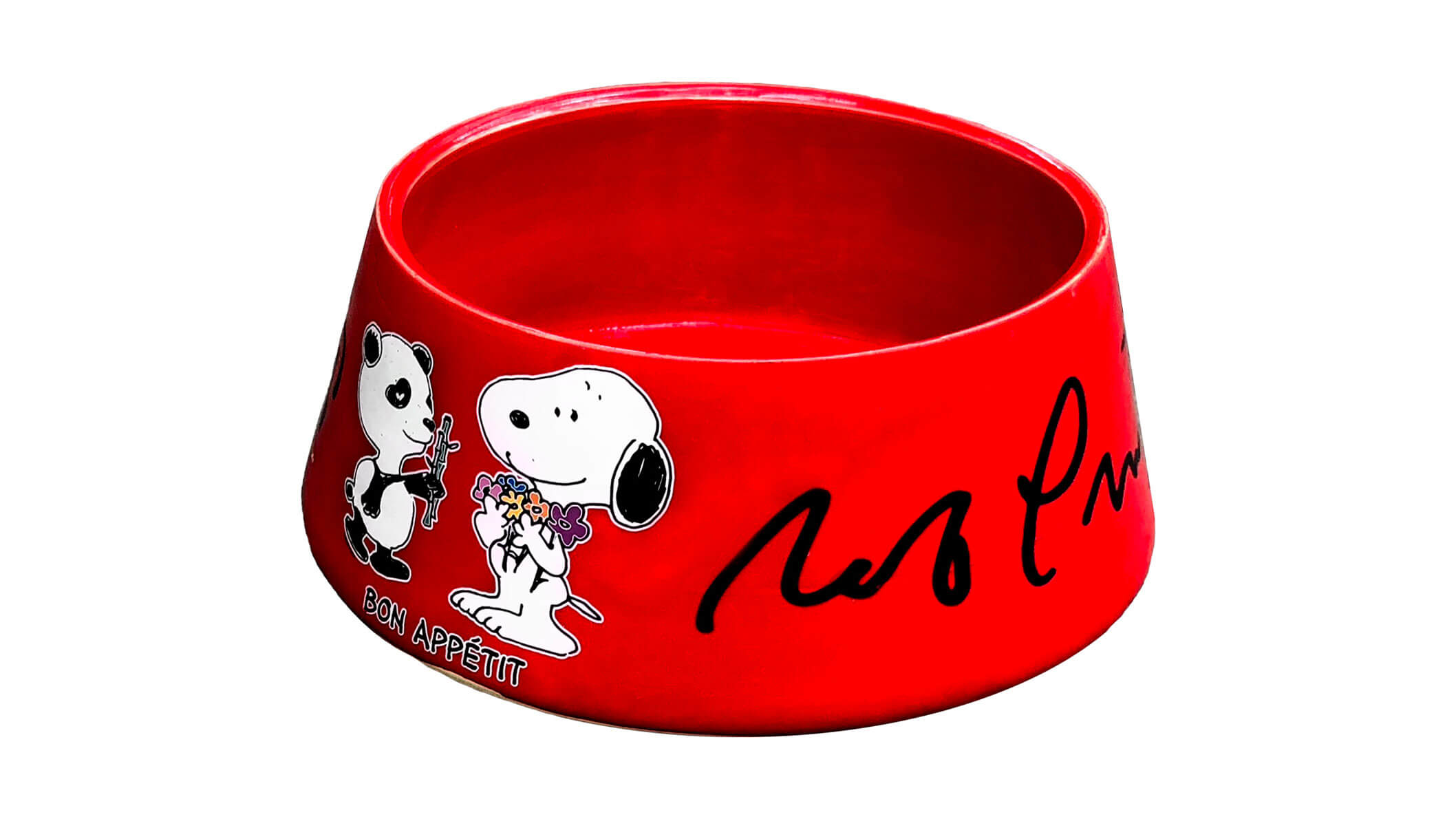 A red dog bowl on a white background. 